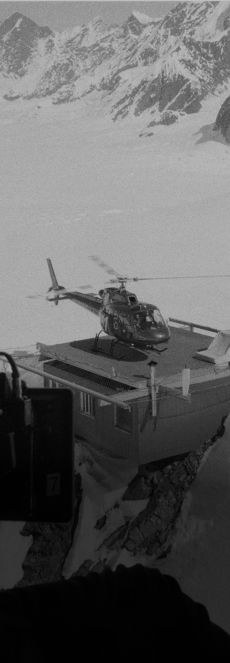 Filming a video production from a helicopter in Alaska by Creative Director, Photographer, Director, Jay Gullion